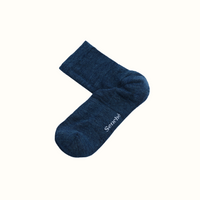 Blue sock with 'Senche' branding on a white background