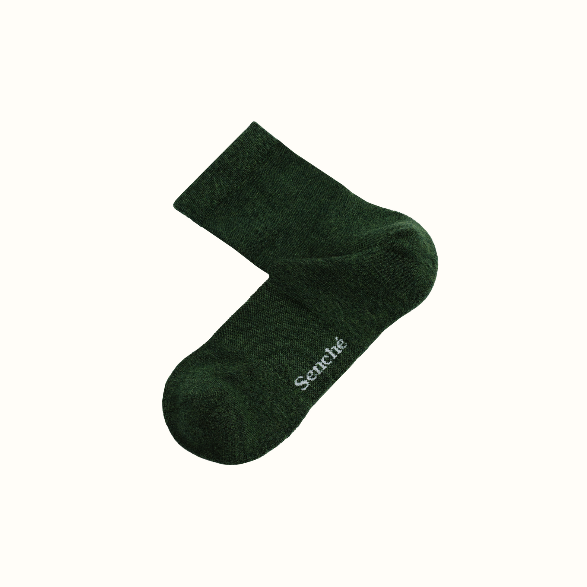 Dark green sock with 'Senche' branding on a white background