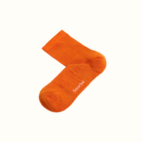 Orange sock with the brand 'Senche' on a white background